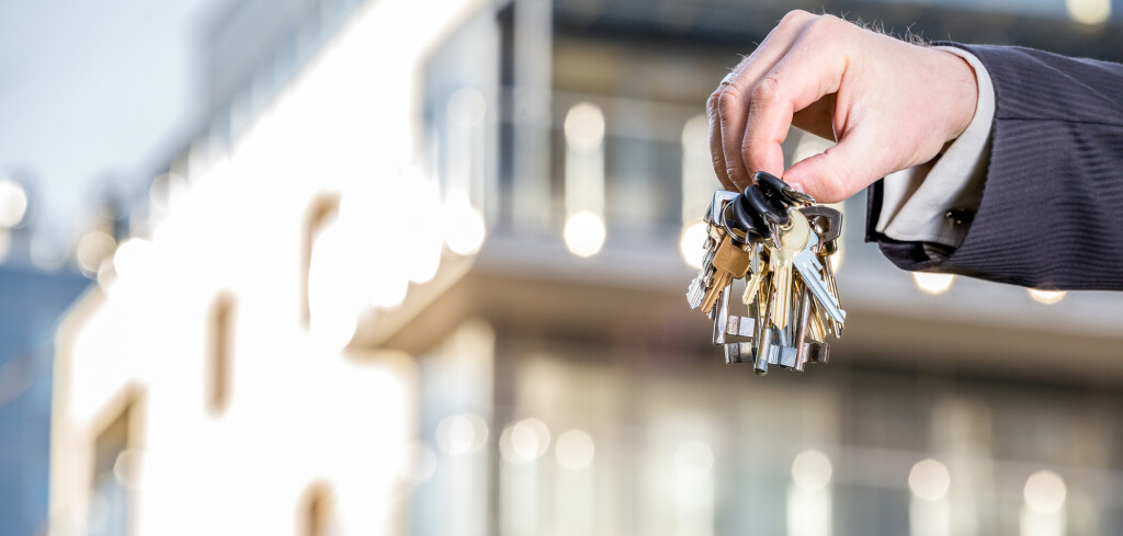 Bunch of keys in hand of elegant man